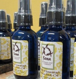 close up image of kukui nut oil in a retail shop surrounding