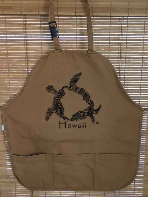 Hawaiian sea turtle apron in durable canvas with petroglyph design
