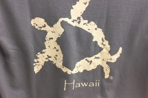 Close up of gray turtle image logo shirt from Hawaii
